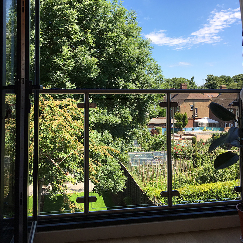 Bespoke glass balustrade on a balcony