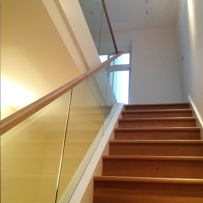Light and modern glass balustrades give this home a classy feel
