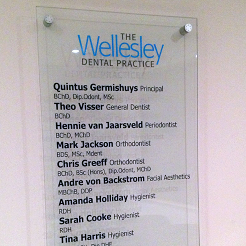 Glass dentists sign