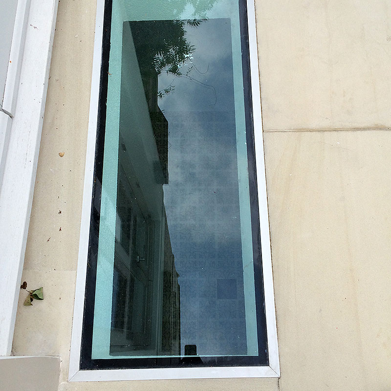 Toughened glass skylight installation in London