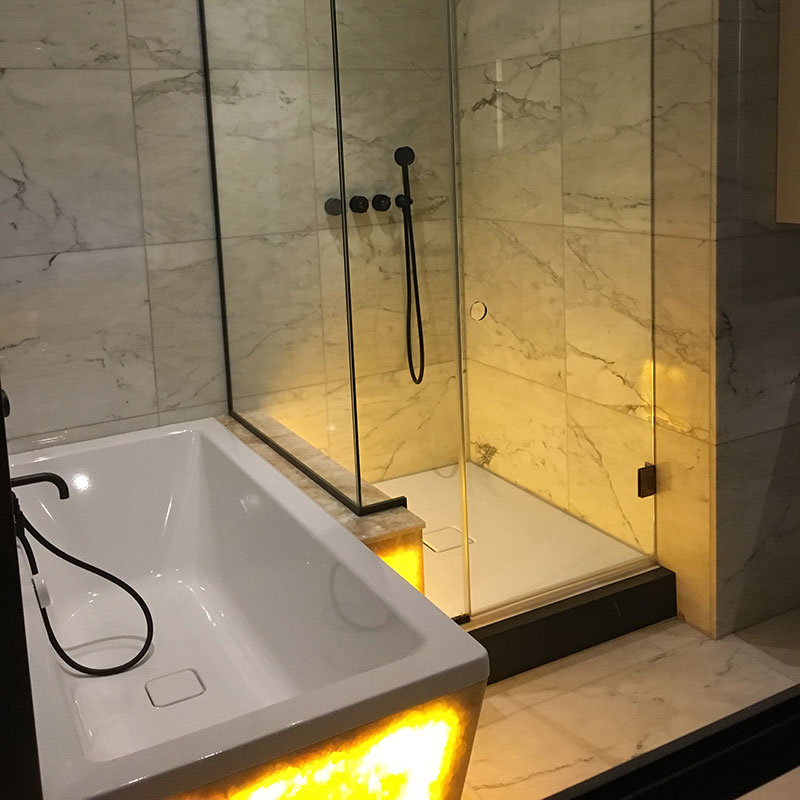 Frameless Shower with a glowing bath