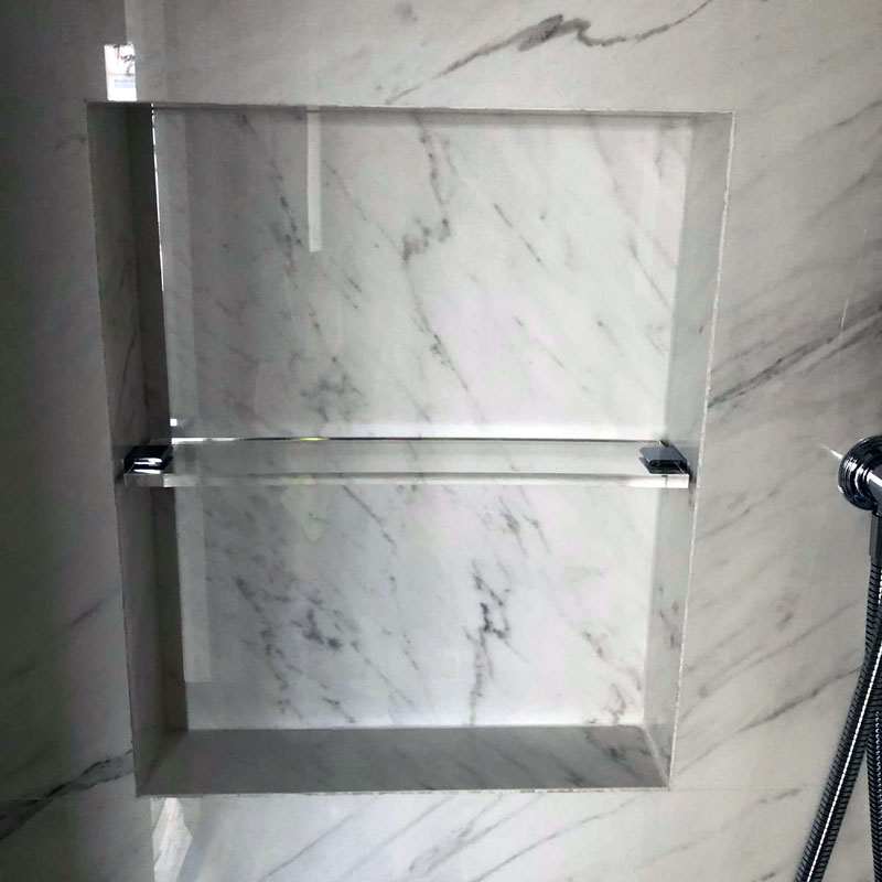 Acrylic shelves in a shower room in London