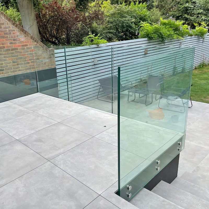 Bespoke glass balustrade outside a house