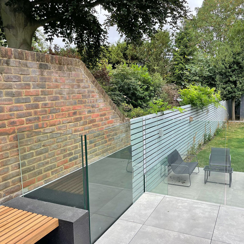 Bespoke glass balustrade outside a house