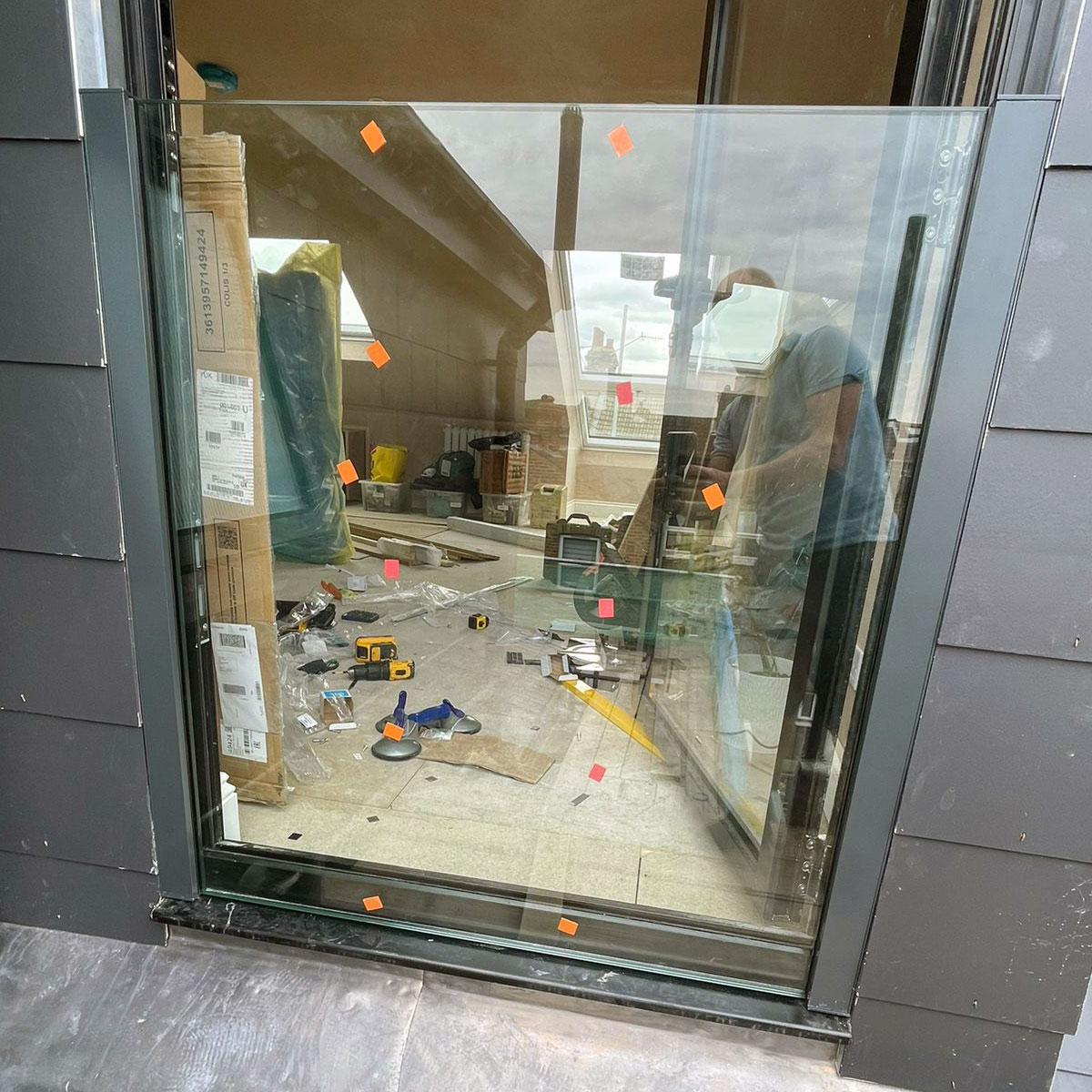 Bespoke glass balustrade being installed