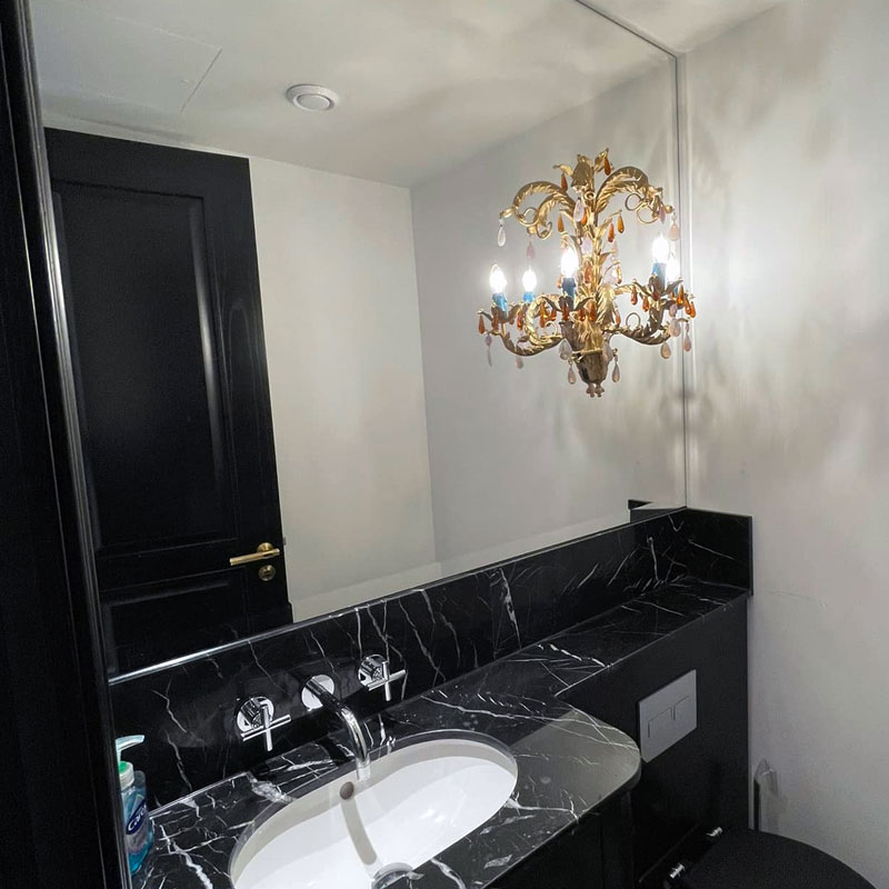 Chandelier set into a mirror