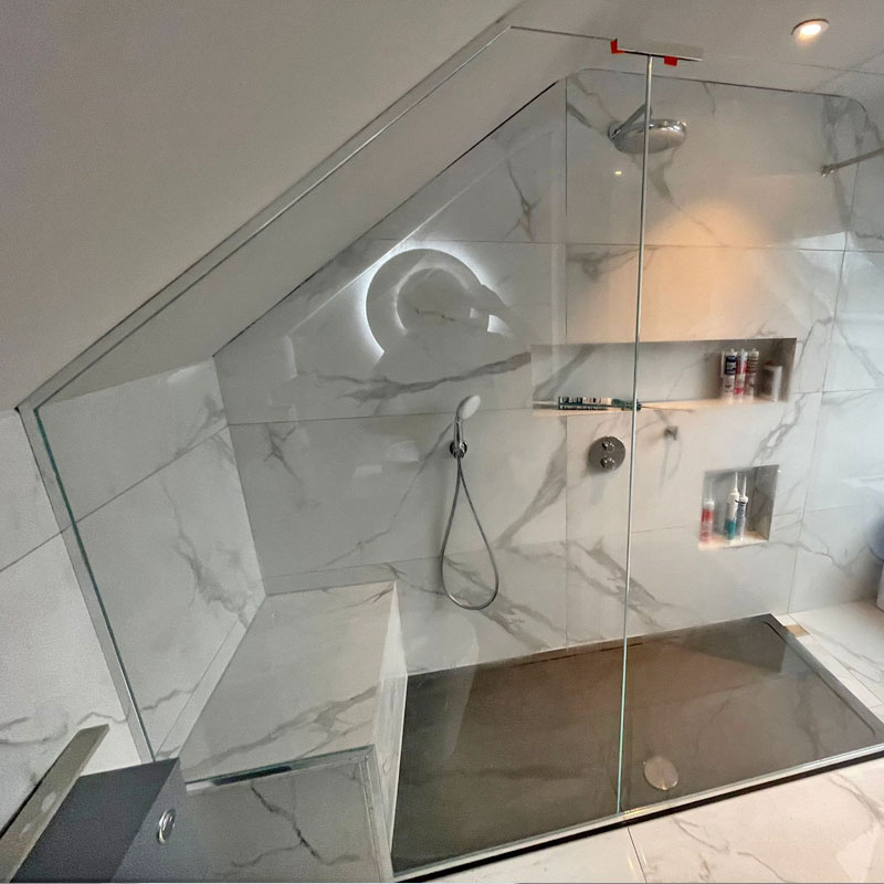 Shaped glass shower door