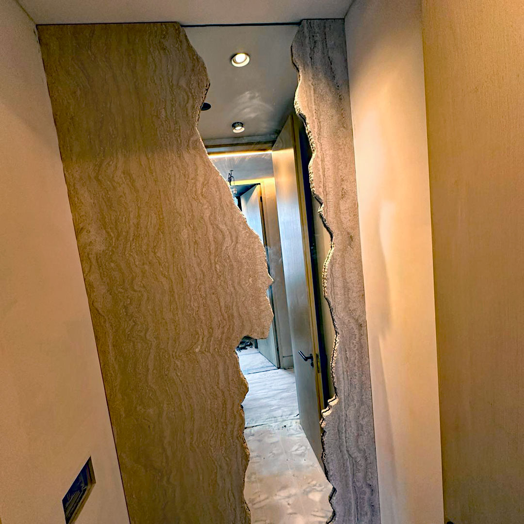 A mirror set into some wood for dramatic effect at this property in Chelsea