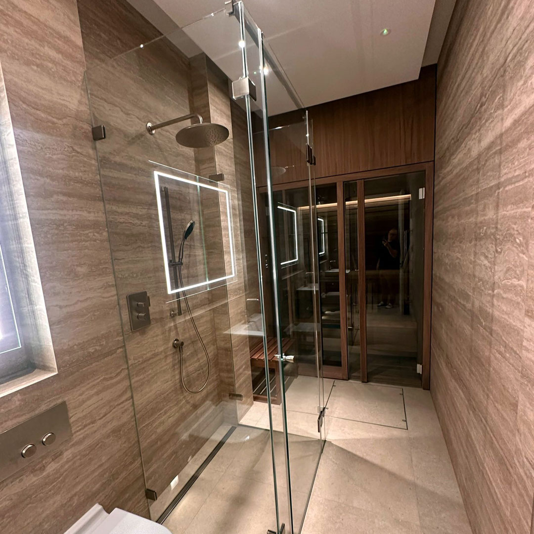 Slim frameless glass shower surround