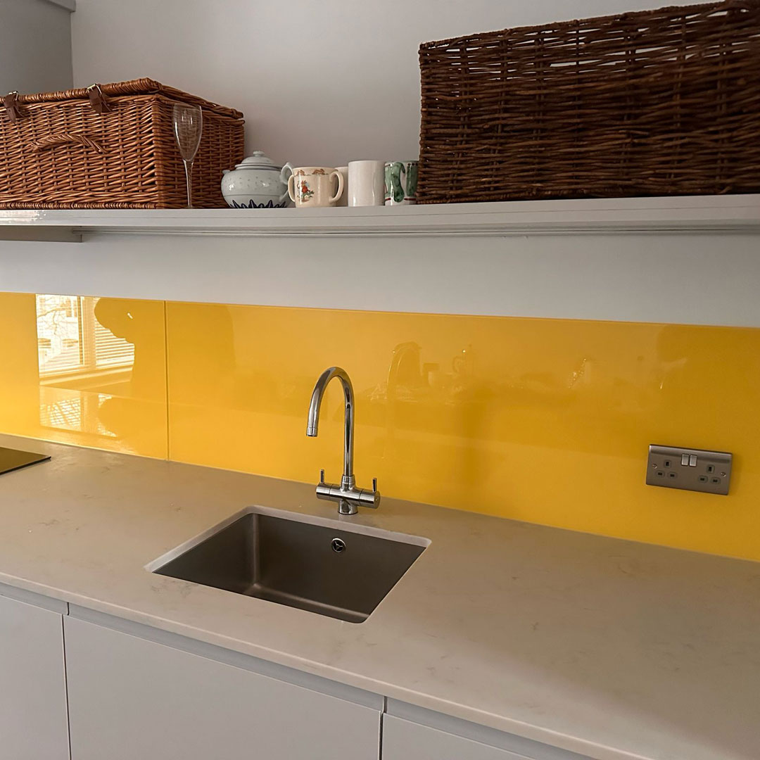 Yellow glass splashbacks in West London