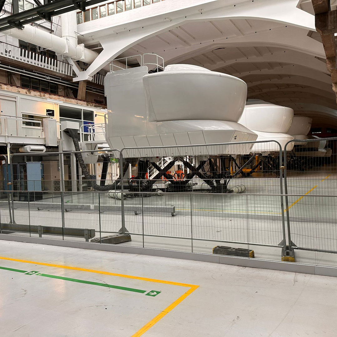 Bespoke glass balustrades in the flight simulator hall at London Heathrow Airport
