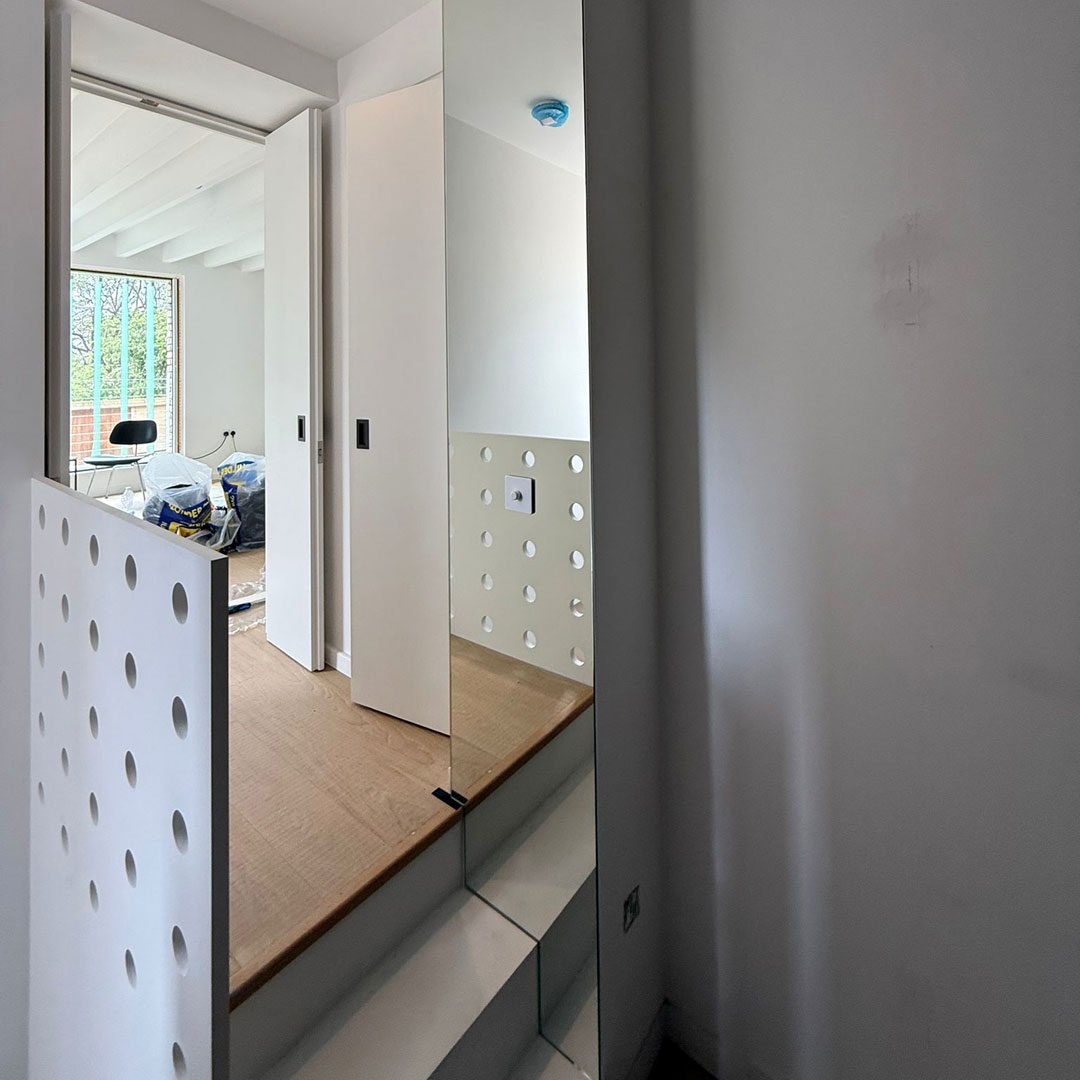 Bespoke mirror in a doorway in Richmond