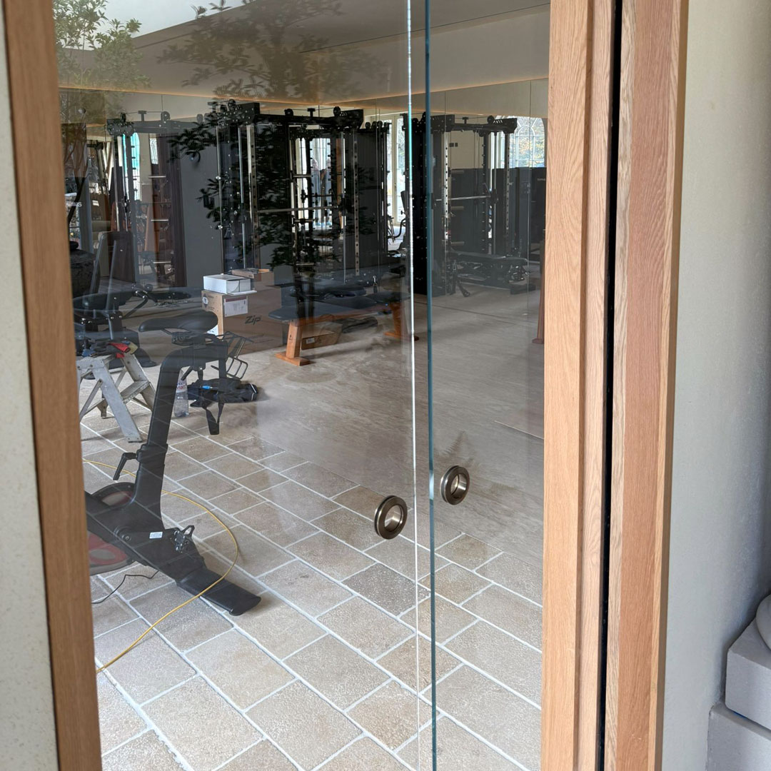 Bespoke glass gym door